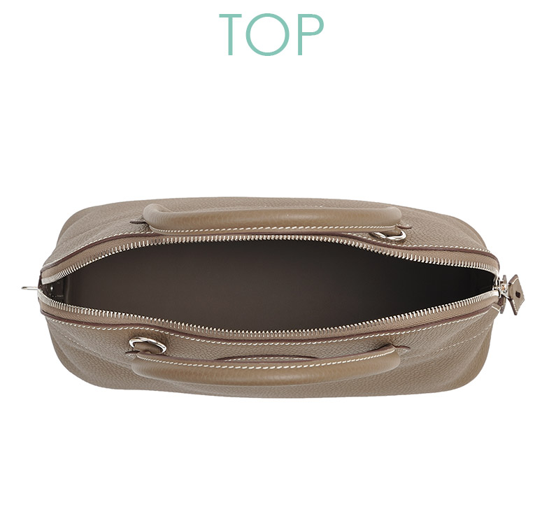 Top It features a zipper that can be excessed smoothly and a wide storage opening.